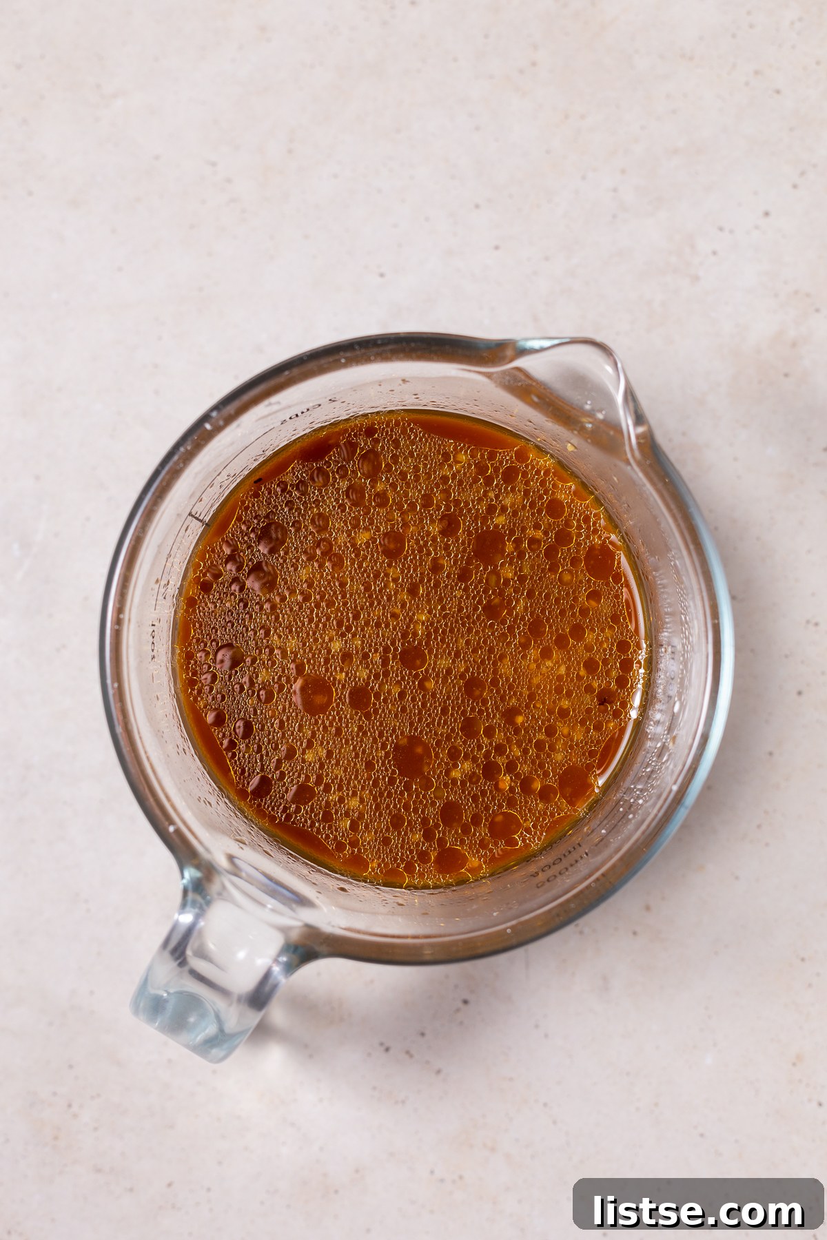 sauce for sesame tofu in a measuring cup