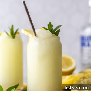 A vibrant glass of Boozy Frozen Lemonade.