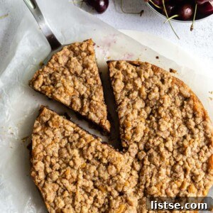 Delicious Chocolate Cherry Coffee Cake with a golden crumble topping.