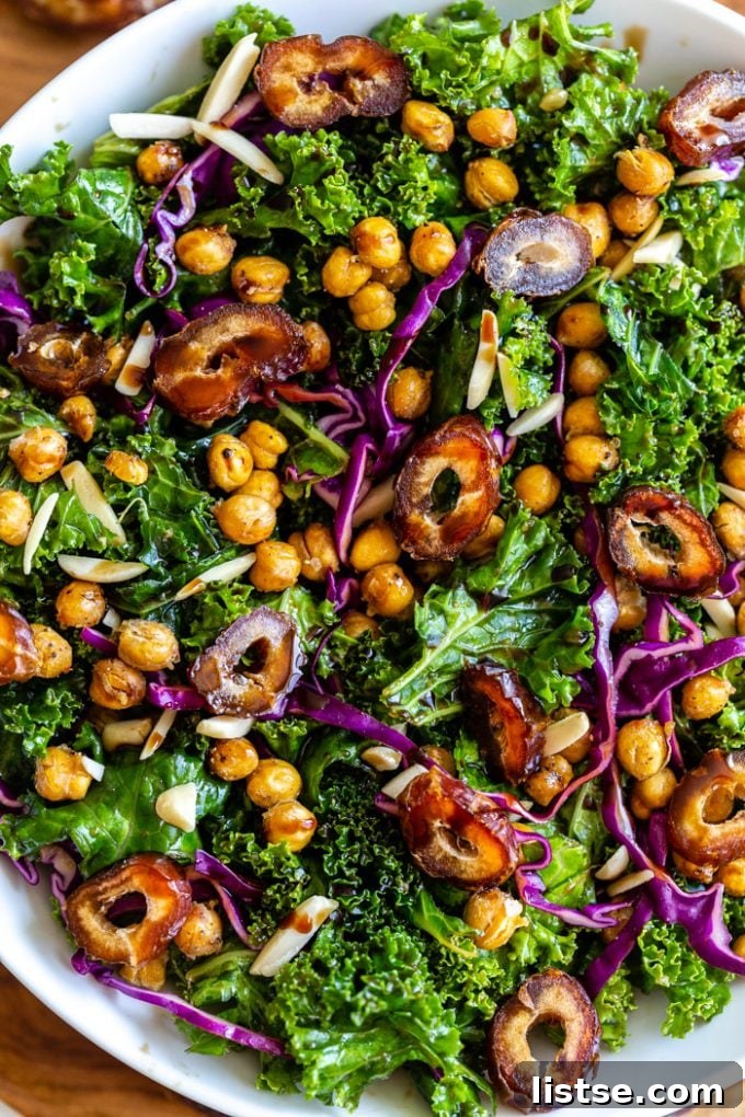 date kale salad with purple cabbage, chickpeas, and almonds