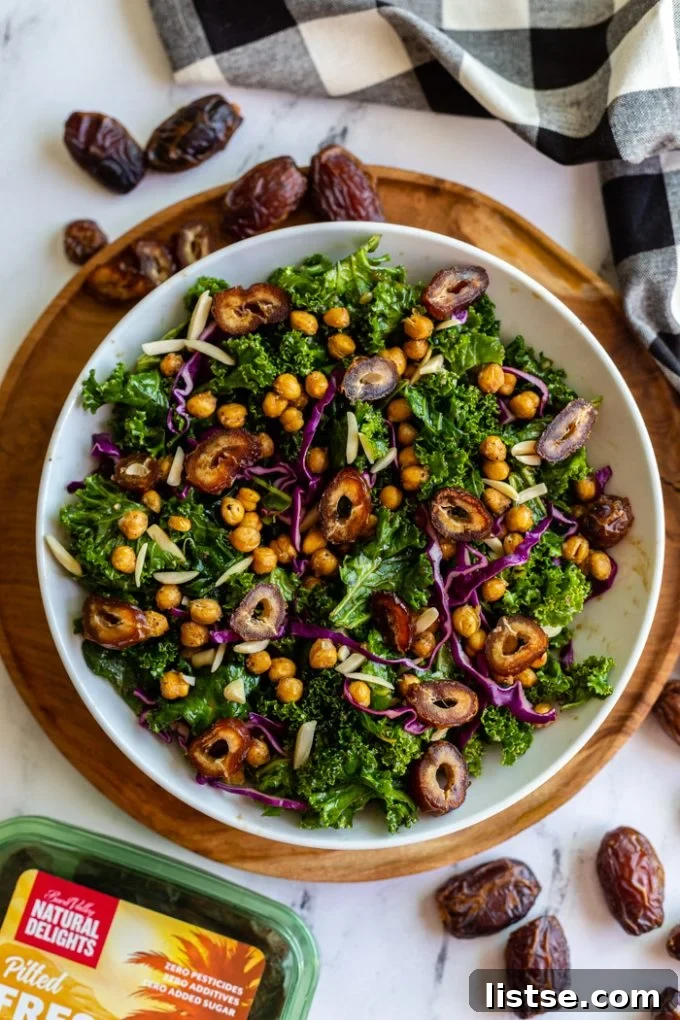 date kale salad with purple cabbage, chickpeas, and almonds