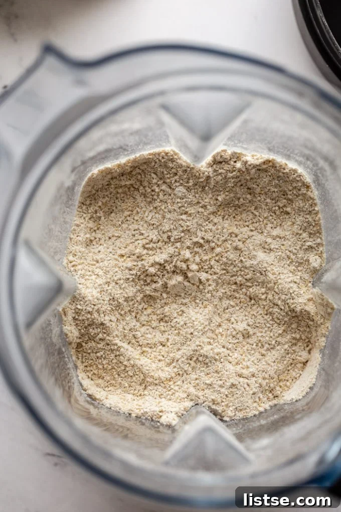 processed oat flour in a blender