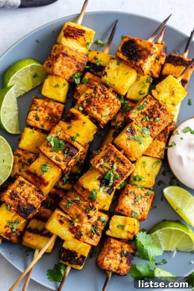 grilled skewers with tofu and pineapple sprinkled with cilantro and lime juice