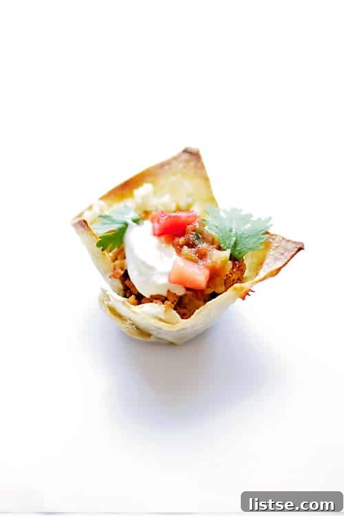 Close-up of freshly baked Taco Salad Cupcakes in a muffin tin