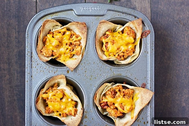 Baked Taco Salad Cupcakes with melted cheese