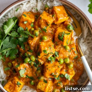 Tofu Tikka Masala in a large bowl with fresh cilantro on top