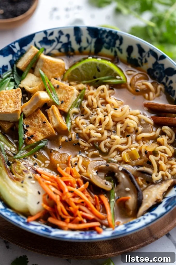 Wholesome Vegan Ramen Comfort 6 A beautifully arranged bowl of vegan ramen, featuring noodles, shiitake mushrooms, carrots, and bok choy
