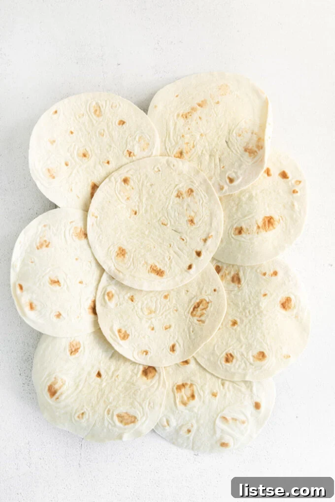 Step-by-step image showing tortillas laid out on a sheet pan with an overhang.