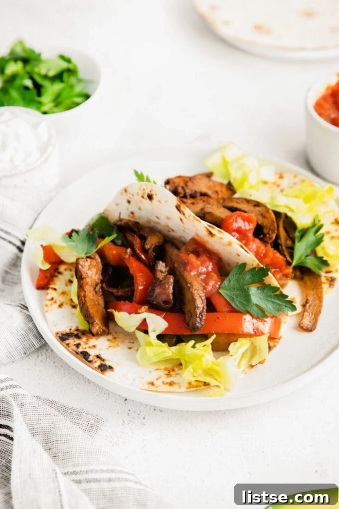 Sizzling Veggie Fajitas 2 vegetarian fajitas served in tortillas