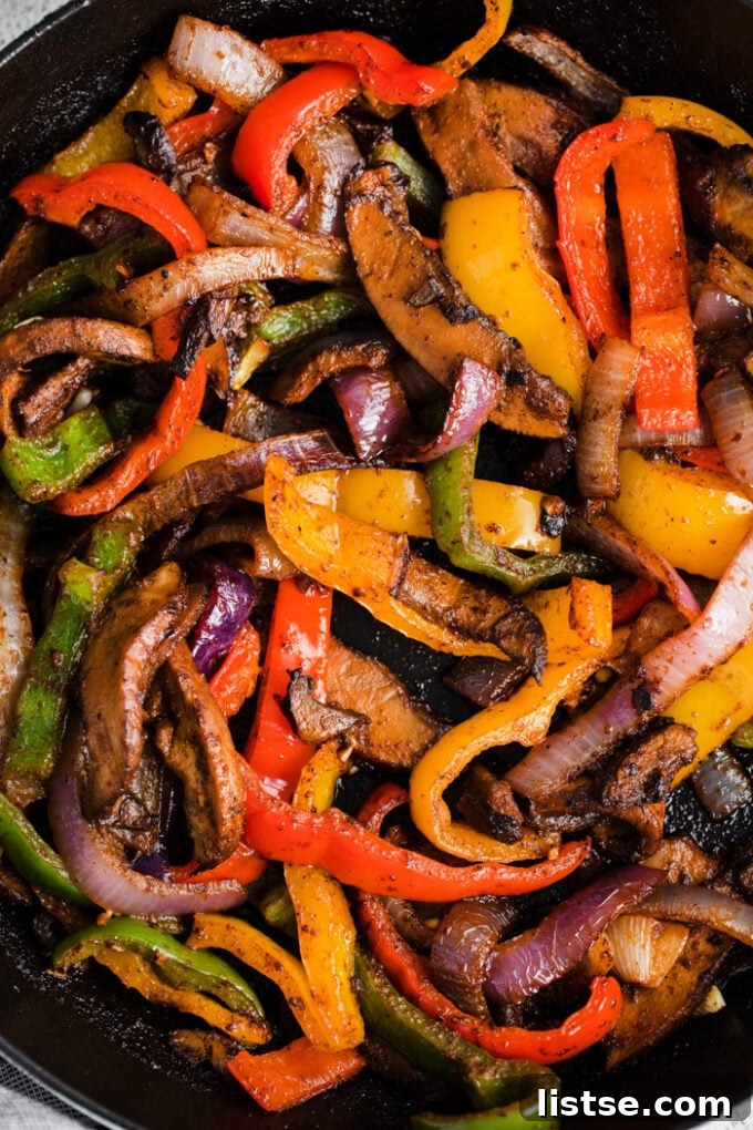 Sizzling Veggie Fajitas 3 fajita veggies cooked in a skillet