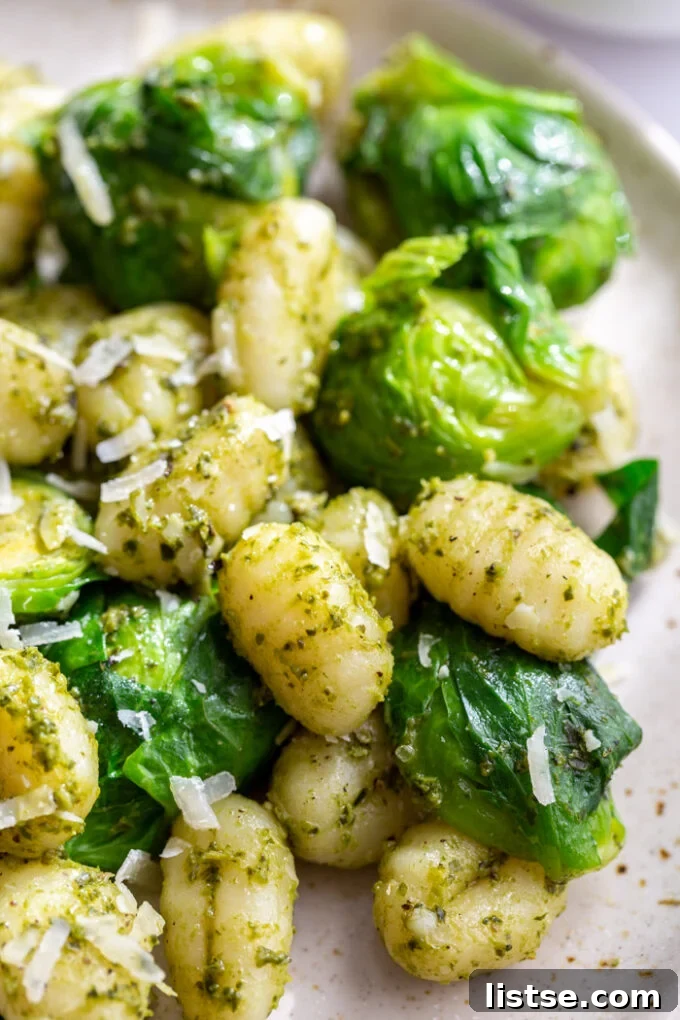 Vibrant Brussels Sprouts Pesto Gnocchi 4 An up-close shot revealing the rich texture and vibrant colors of Brussels Sprouts Pesto Gnocchi.