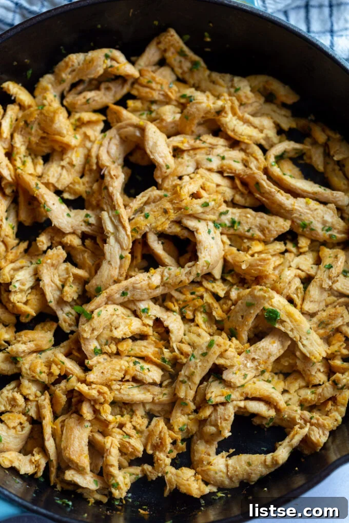 soy curls being cooked in a cast iron skillet