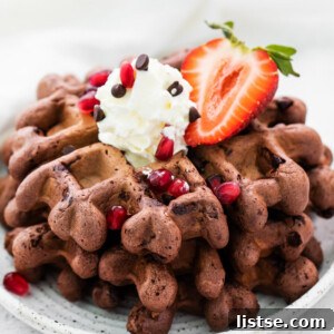 Decadent Chocolate Waffles 5 chocolate waffles topped with whipped cream and strawberries