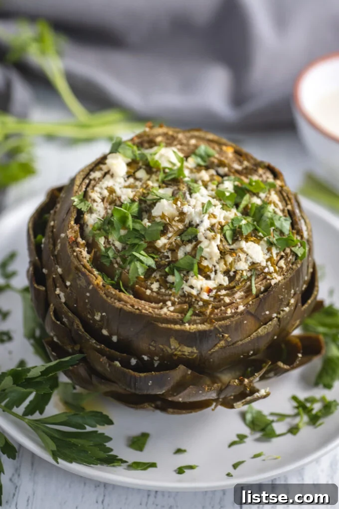 Mediterranean Baked Artichokes topped with feta and parsley