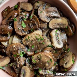 sautéed baby Bella mushrooms served in a small bowl