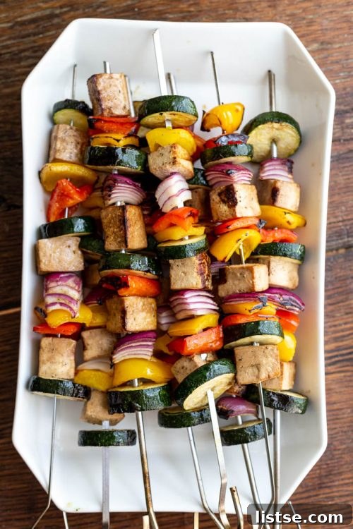 K-Food Wonders 2 Grilled tofu kebabs with colorful vegetables on skewers, ready to be served