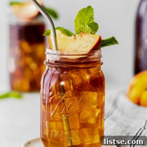 Homemade Peach Iced Tea served in a glass, ready to be enjoyed.