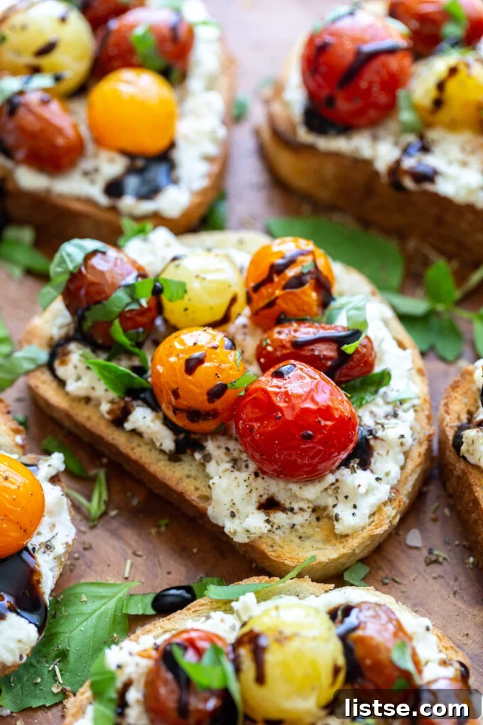 A beautifully composed shot of ricotta toast on a plate, highlighting the fresh ingredients.