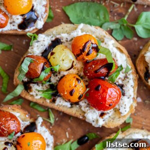 toast topped with ricotta, blistered tomatoes and basil