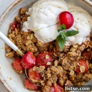 Sweet Cherry Crumble 5 cherry crisp served with vanilla ice cream
