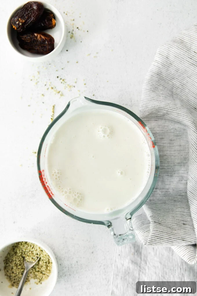 hemp milk in a large glass measuring cup