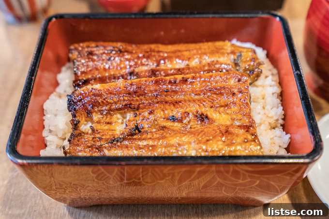 Uncommon U-Starting Culinary Delights 5 Grilled unagi served over rice, a classic Japanese dish.