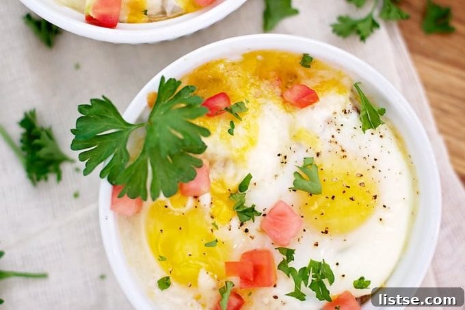 Y-Foods: A Tasty Exploration 5 A simple yet elegant egg drop soup with visible egg yolks, garnishes, and a clear broth. The yolks provide richness.