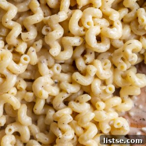 cavatappi pasta cooked in a parmesan cheese cream sauce