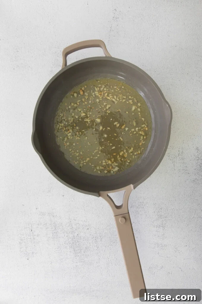 cooking garlic in a skillet