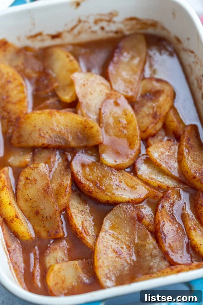 baked cinnamon apples in a baking dish