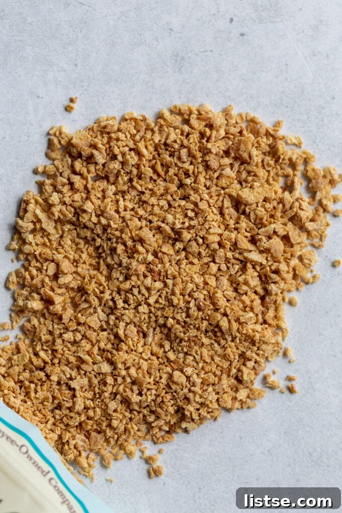 Another perspective of dry textured vegetable protein (TVP) flakes, showcasing their light color and texture