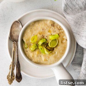 Vegan Potato Leek Soup in a small white soup bowl