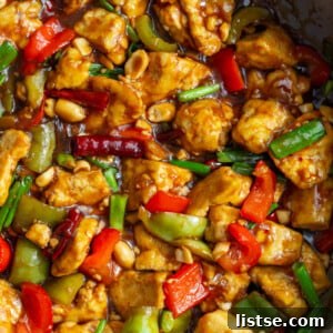 Kung Pao Tofu cooked in a large skillet