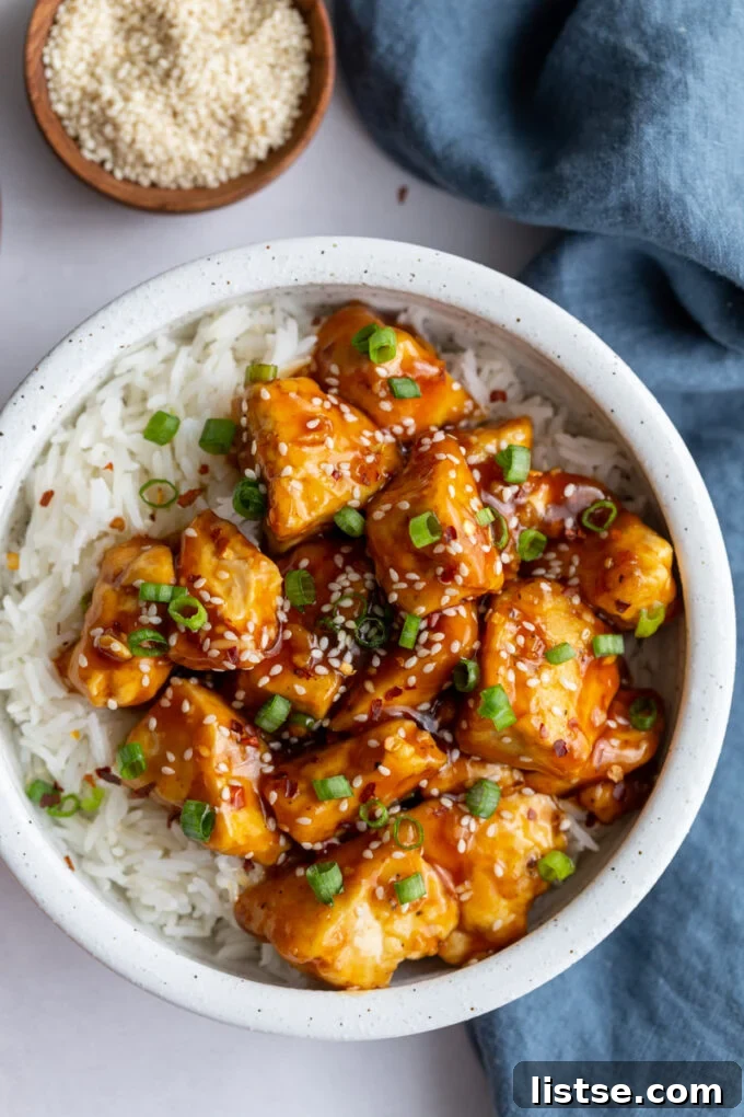 Golden Crispy General Tso Tofu 4 General Tso's Tofu in a bowl with rice