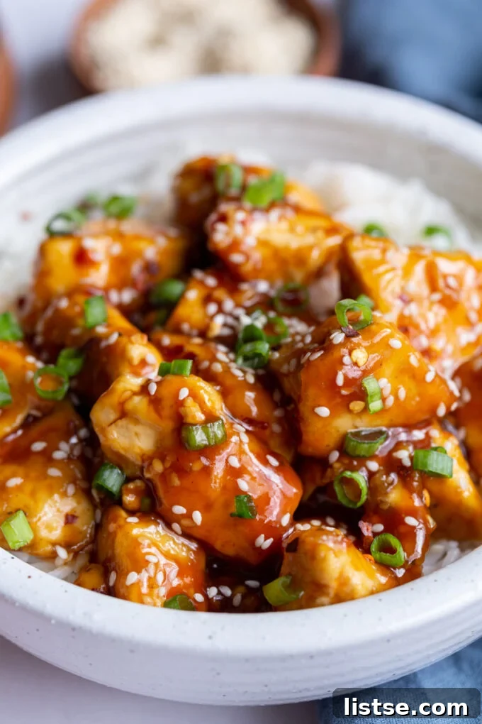Golden Crispy General Tso Tofu 6 General Tso's Tofu served over rice and garnished with green onion