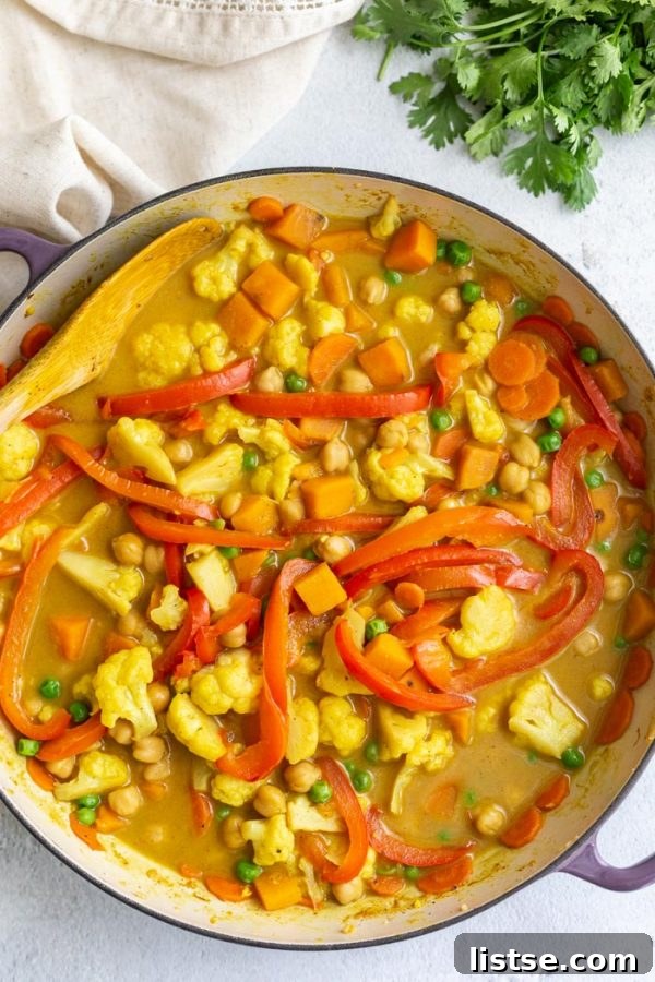 Inspired Chickpea Meals 10 A bowl of Chickpea Sweet Potato Coconut Curry, highlighting the creamy texture and rich colors of this delicious vegan dinner.