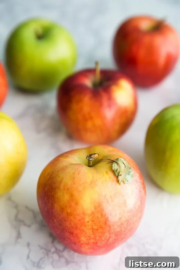 Appetizing A-Foods: A Culinary Exploration 7 red and green apples in a wooden crate