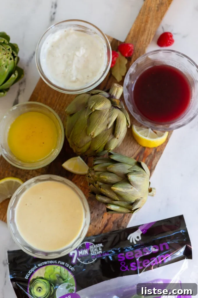 Sensational Artichoke Dips 8 Four distinct artichoke dipping sauces beautifully arranged on a wooden cutting board, with two steamed artichokes.