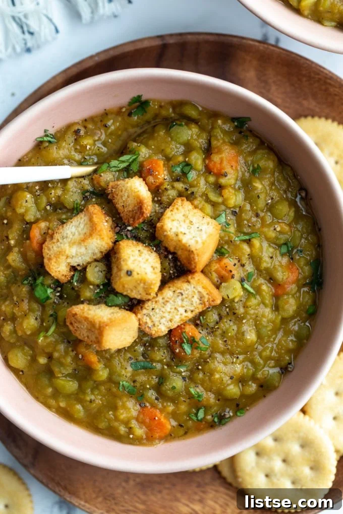 vegan split pea soup topped with croutons