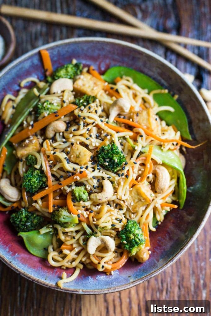 Vegan chow mein served in a bowl, with perfectly cooked noodles and broccoli florets