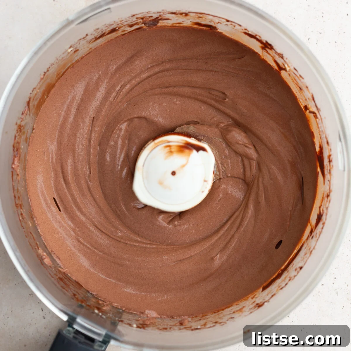Dreamy Vegan Silken Tofu Chocolate Mousse 6 Blended silken tofu chocolate mousse in a food processor, ready to be served or chilled.