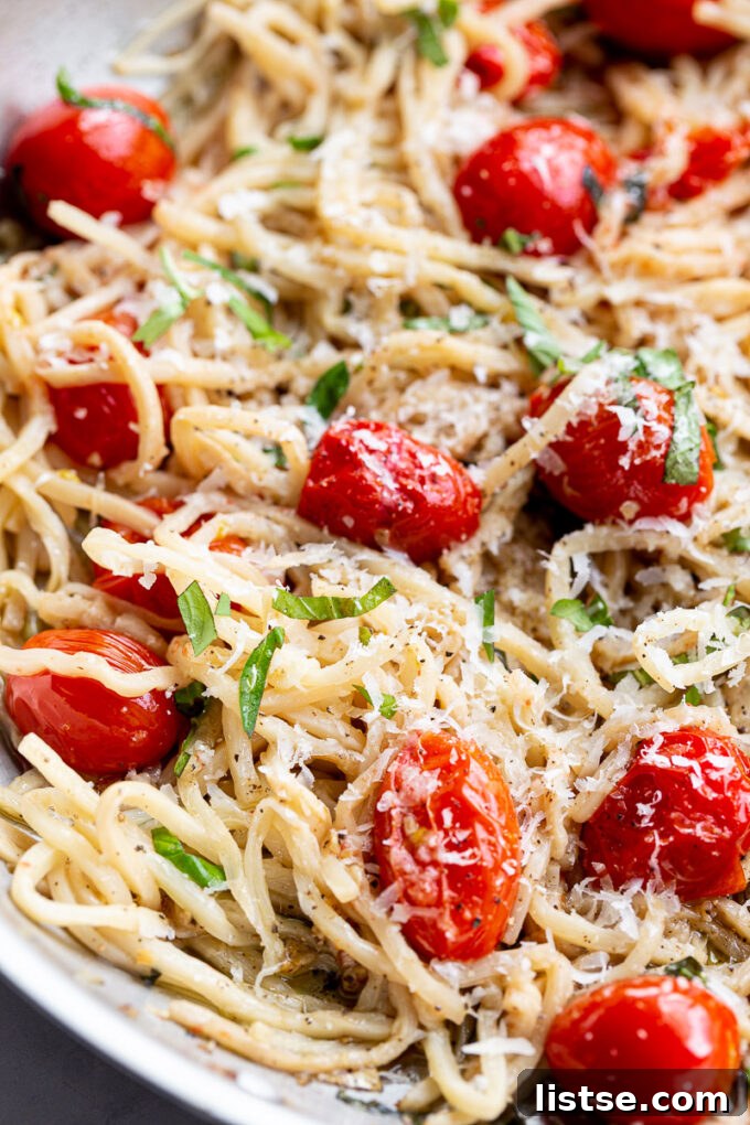 Hearts of palm noodles generously topped with fresh basil, grated parmesan cheese, and halved cherry tomatoes.