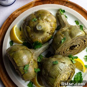 Roman artichokes braised on a plate, ready to eat