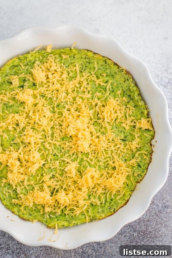 The zucchini quiche, ready for baking with its flavorful filling.