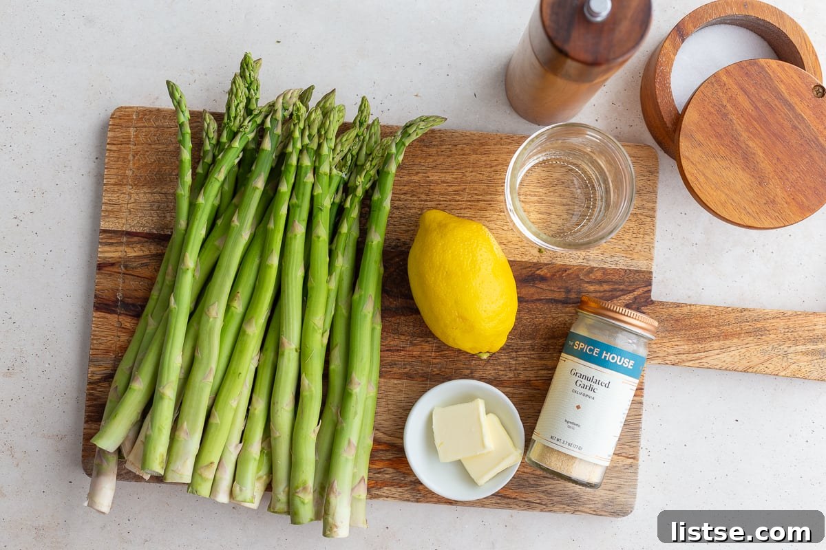 Speedy Skillet Asparagus 4 ingredients laid out to make stovetop asparagus