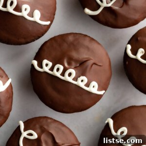 Top-down view of vegan chocolate Hostess cupcakes with white swirled frosting