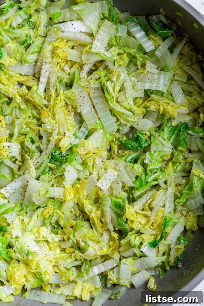 Golden Napa Cabbage Sauté 4 Cooked cabbage in a skillet.