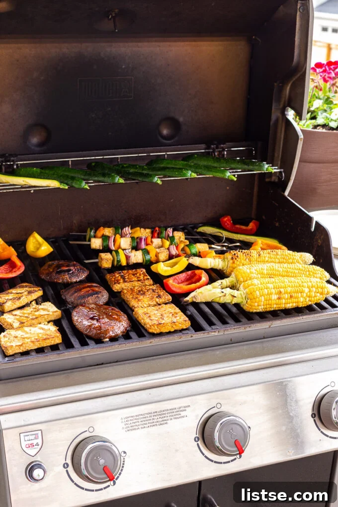 Sizzling Vegetarian Grills 2 A vibrant selection of vegetarian foods expertly grilled, showcasing colorful vegetables, proteins, and fruits on a hot grill.