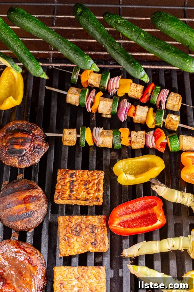 Sizzling Vegetarian Grills 3 A selection of grilled vegetarian delights, including colorful vegetable kebabs, perfectly seared tofu, and assorted seasonal vegetables arranged on a grill.