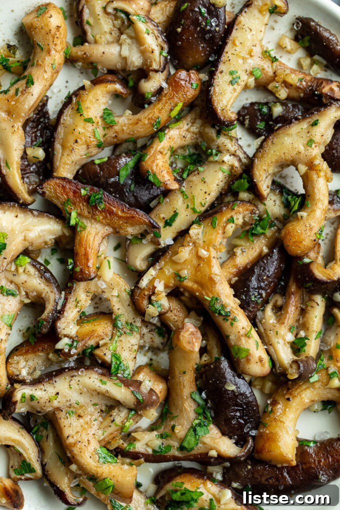Sautéed Shiitake Mushrooms garnished with fresh parsley.